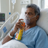 A COPD patient using Fit&Wise Portable Oxygen Can to get pure oxygen
